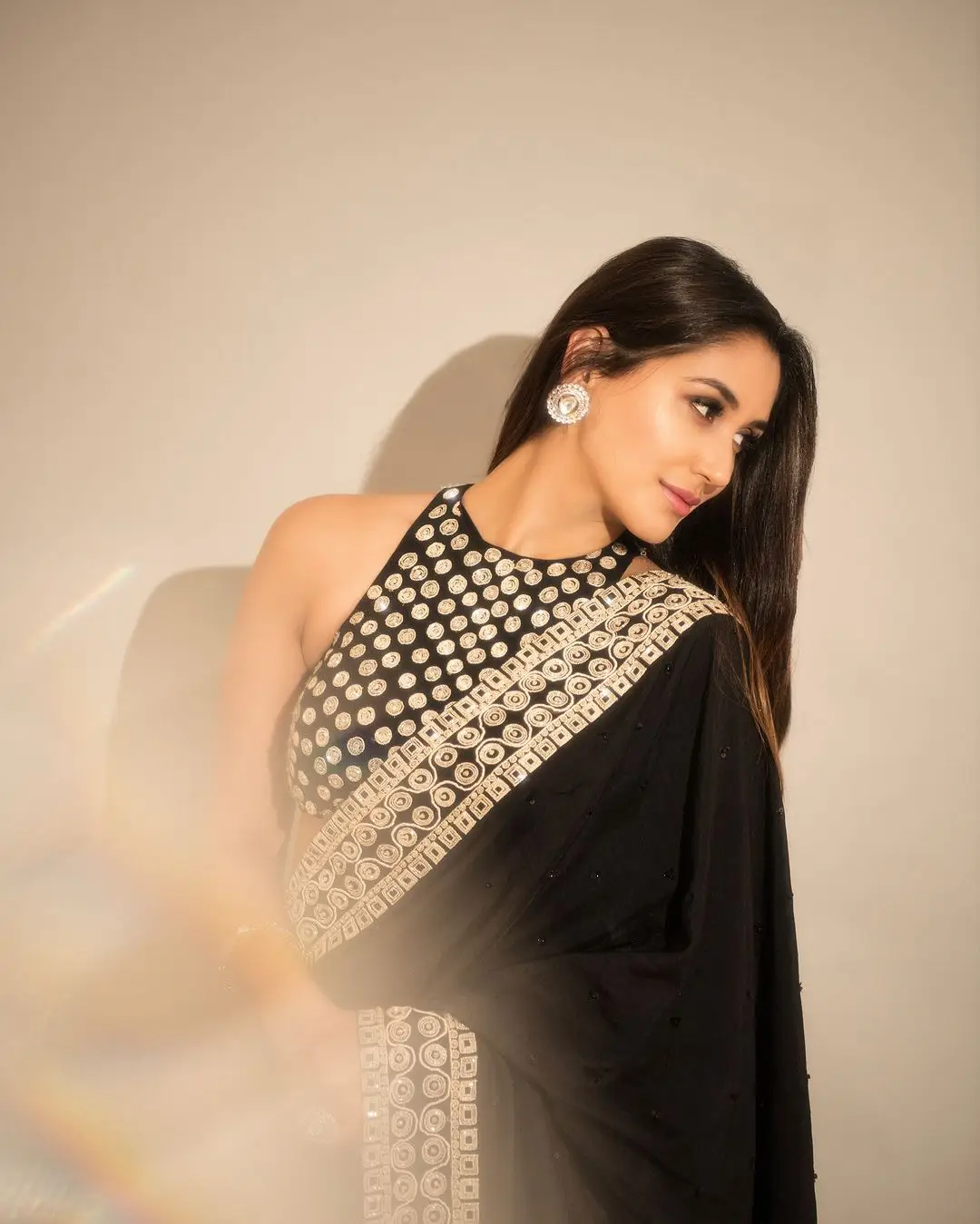 Hindi Actress Nikita Dutta in Black Saree Sleeveless Blouse